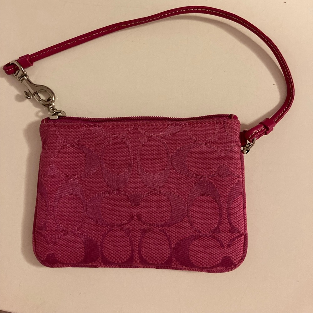 Pink canvas Coach wristlet